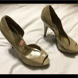 Tan patent leather peak toe heels